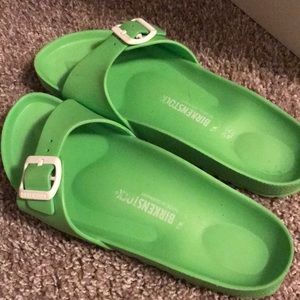 Neon green Birkenstock slides